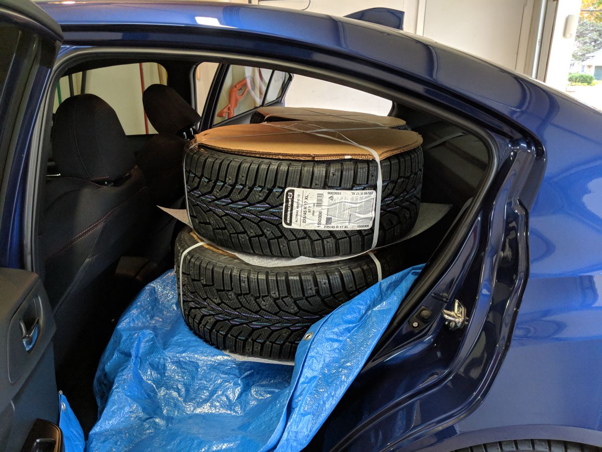 Set of tires in the backseat