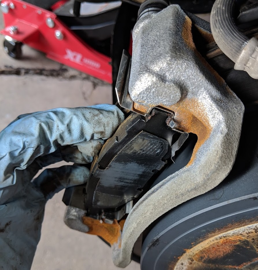 Unpainted brake calipers w/ corrosion