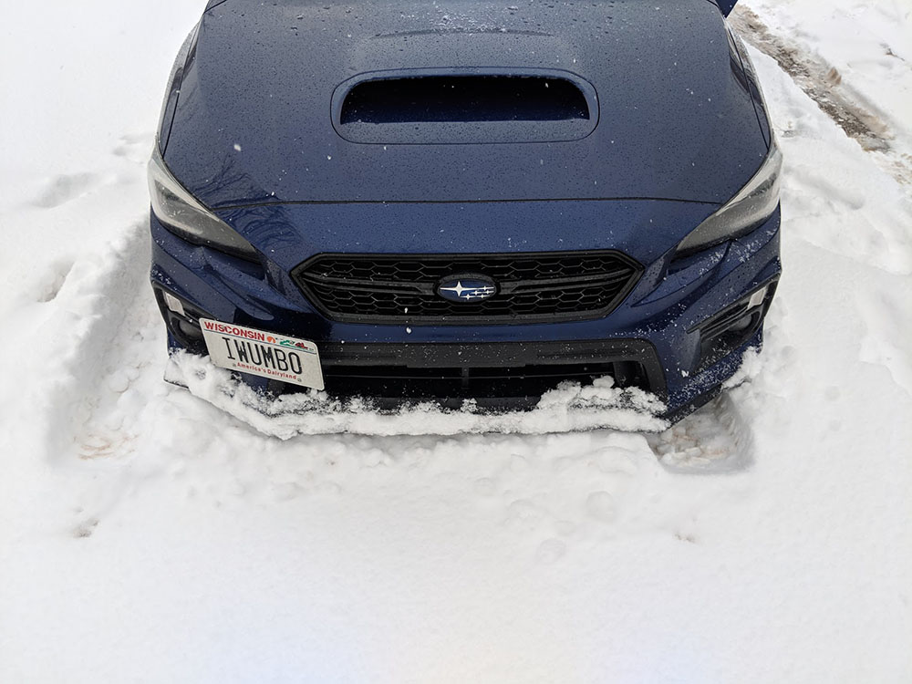 Plowing snow with the front lip