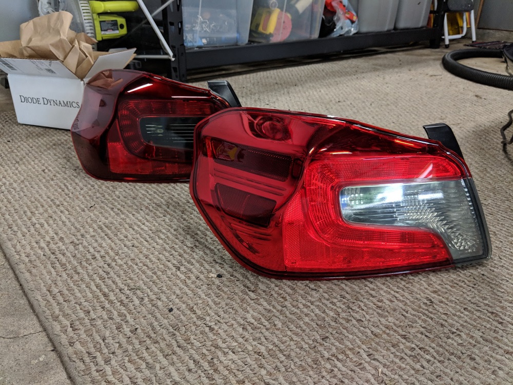 Comparing the painted/unpainted taillights