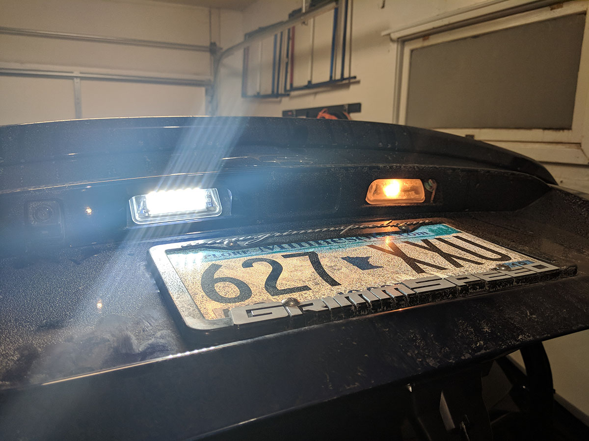 OEM license plate light vs LED