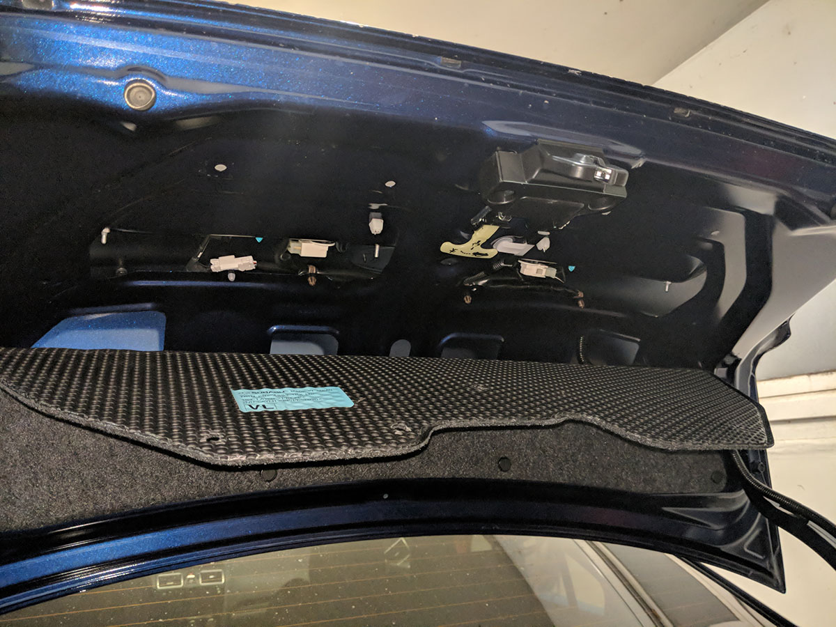 Removing half of the trunk lid lining
