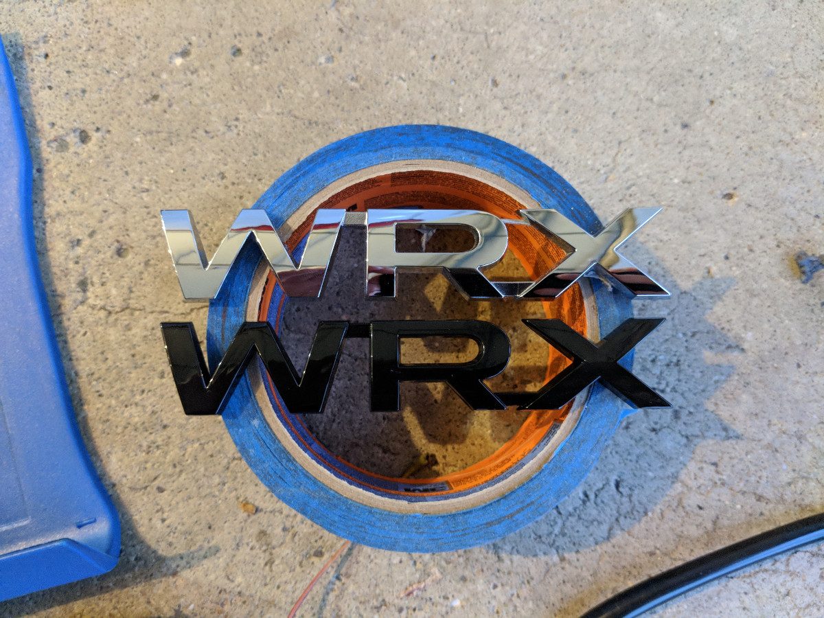 Replacement black WRX badge
