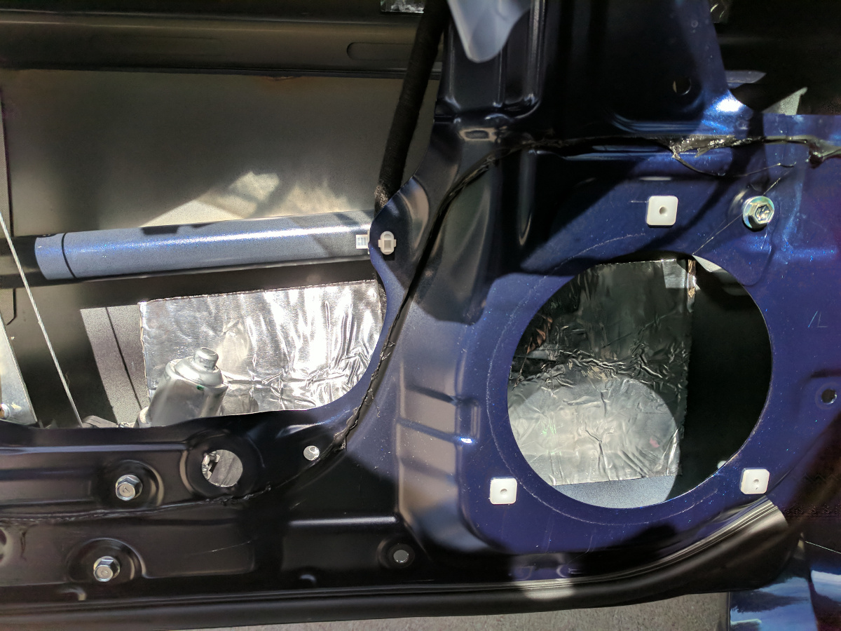 Applying deadening to the door panel